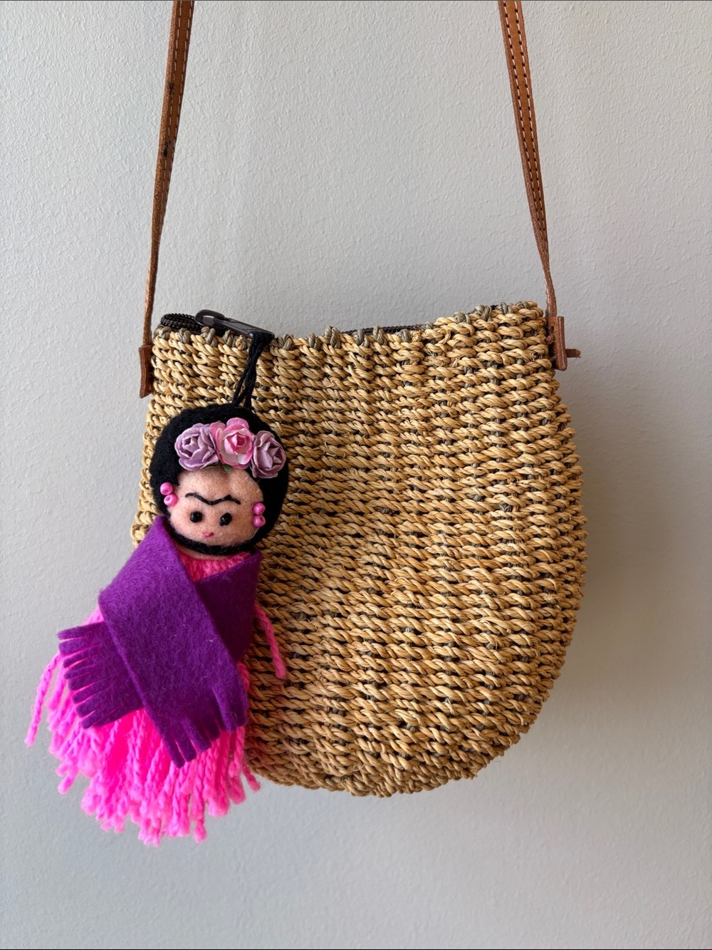 Sarah Stewart Straw Crossbody Bag with Pink & Purple Frida Doll Charm